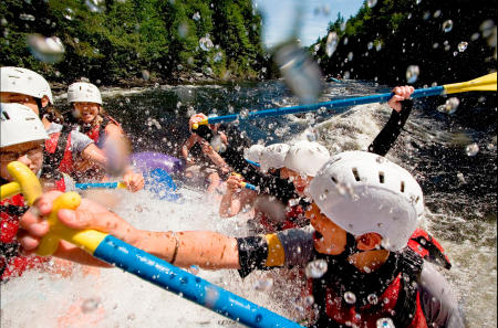 White water rafters navigate Class 3 water on Maine's Kennebec River. Shot for Time magazine.