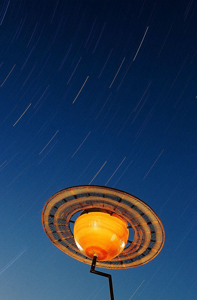 A scale model of Saturn is set against northern Maine skies. Shot for Smithsonian magazine.
