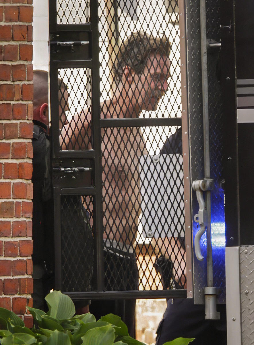 Portland Police take suspect gunman Brian Kelley into custody on Cedar Street.