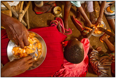 GLCI Beneficiaries in Western Kenya enjoy cassava produced from GLCI seed.