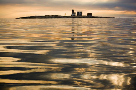 Mt. Desert Island, 25 miles off the Maine coast, protrudes from the Atlantic like a surfaced submarine.