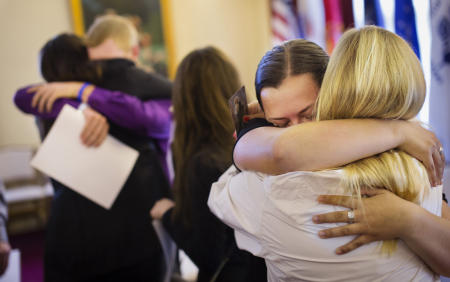 Mourners during the wake of Treyjon Arsenault, 19, who was shot and killed in Portland.