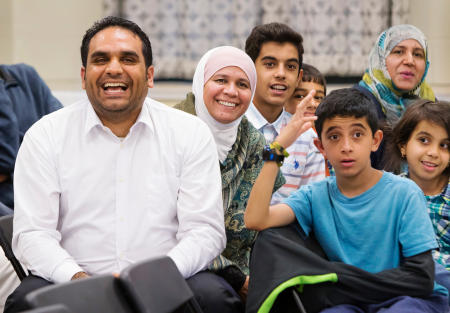 An Iranian immigrant family participates in a voter education session before voting for the first time in the 2016 election.