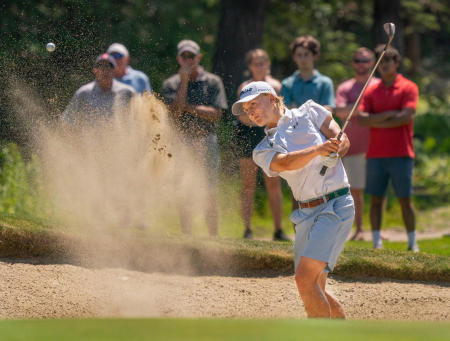 Eventual winner Eli Spaulding hits out of the sand trap during final round action of the 2024 Maine Amateur Championship at the Purpoodock Club in Cape Elizabeth.